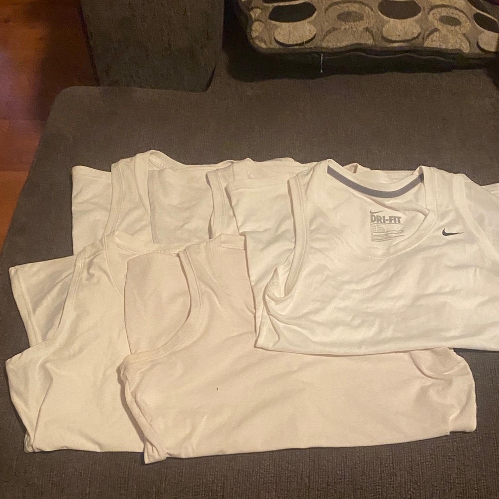 Lot of 2 UA and 3 Nike Dri-FIT White Tank Tops size medium.